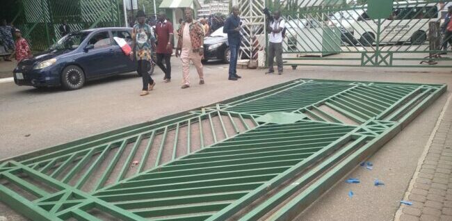 NLC protesters pull down National Assembly gate