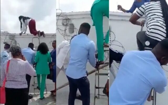 Bank Staff Scale Fence To Escape From Angry Customers