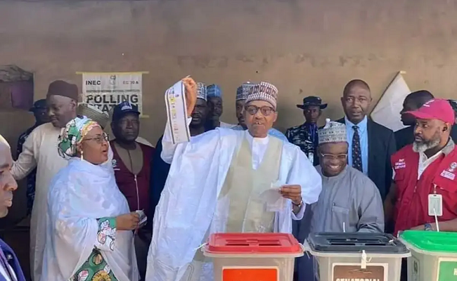 Buhari shows ballot paper after voting in Katsina