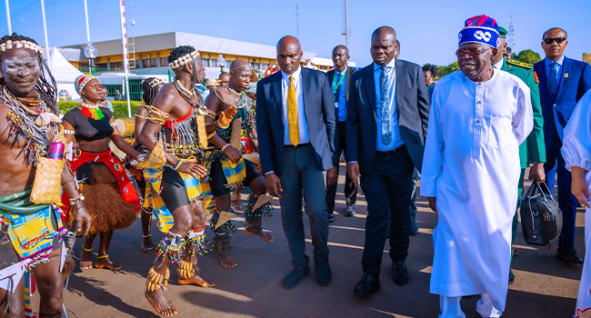 Tinubu Arrives Guinea-Bissau For ECOWAS Summit, Visits Nigerian Troops