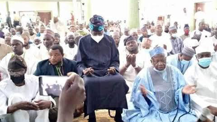 TINUBU SEATED PRAYING IN MOSQUE