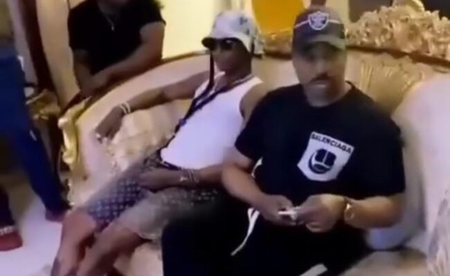 VIDEO: Wizkid pays surprise visit to MC Oluomo in Lagos