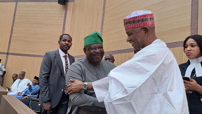 Abba Kabir Yusuf and Caleb Mutfwang greet each other at the Supreme Court in Abuja