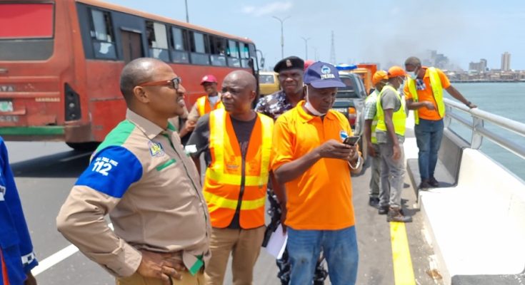 18-seater bus accident on Third Mainland Bridge flings two passengers into Lagoon