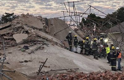Four dead, dozens trapped in South Africa building collapse