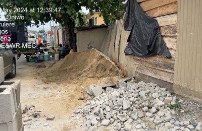 Lagos govt seals building for blocking drainage, road with building materials