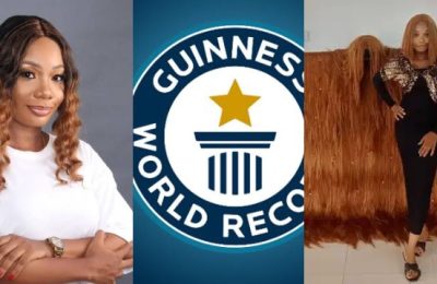 Nigeria's Helen Williams Sets Guinness Record For Widest Handmade Wig