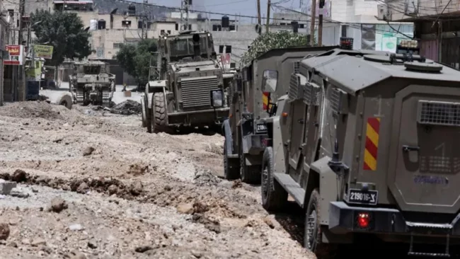 Israeli soldier killed, 16 injured in West Bank raid