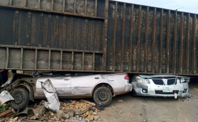 Eight school children escape death as truck falls on cars in Kogi