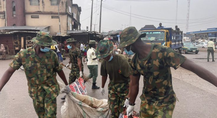 Soldiers Clean Market, Drainage In Ogun Amid Cholera Outbreak