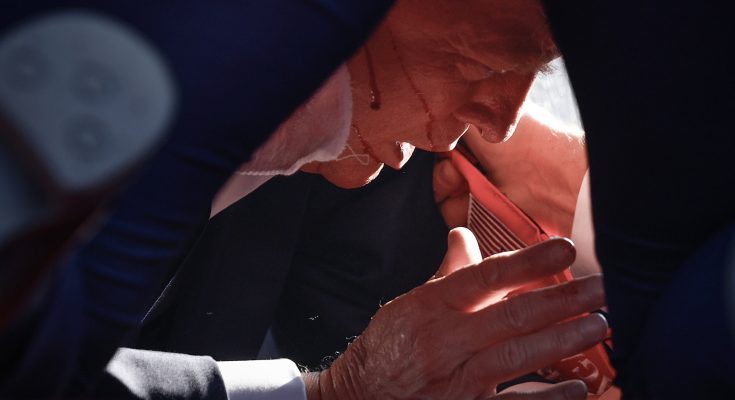 Trump Rushed Off Stage After Bullet Grazes His Ear During Campaign