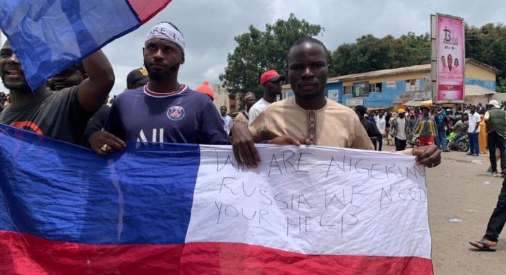 #EndBadGovernance Protesters Call For Help As Russian, Japanese Flags Spotted In Jos (Pictures)