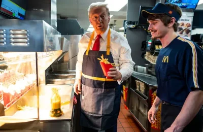 Moment Trump served fries at McDonald's ahead US election