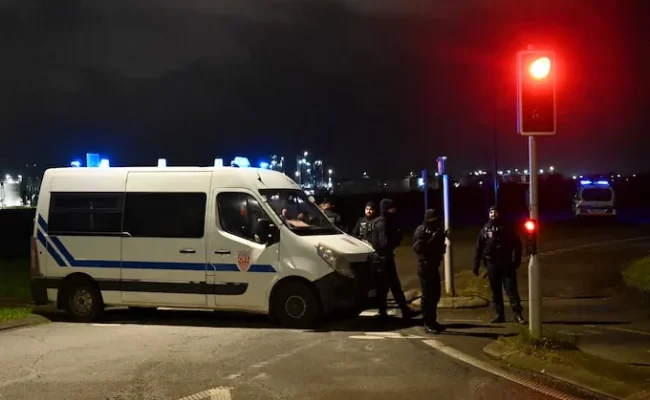 Five killed in shootings around French migrant camp